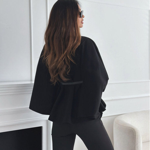 Veste cape élégante ceinturée